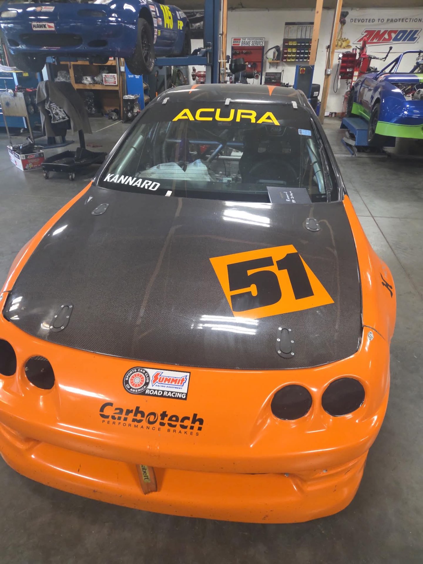 #51 orange Acura road racer wrap